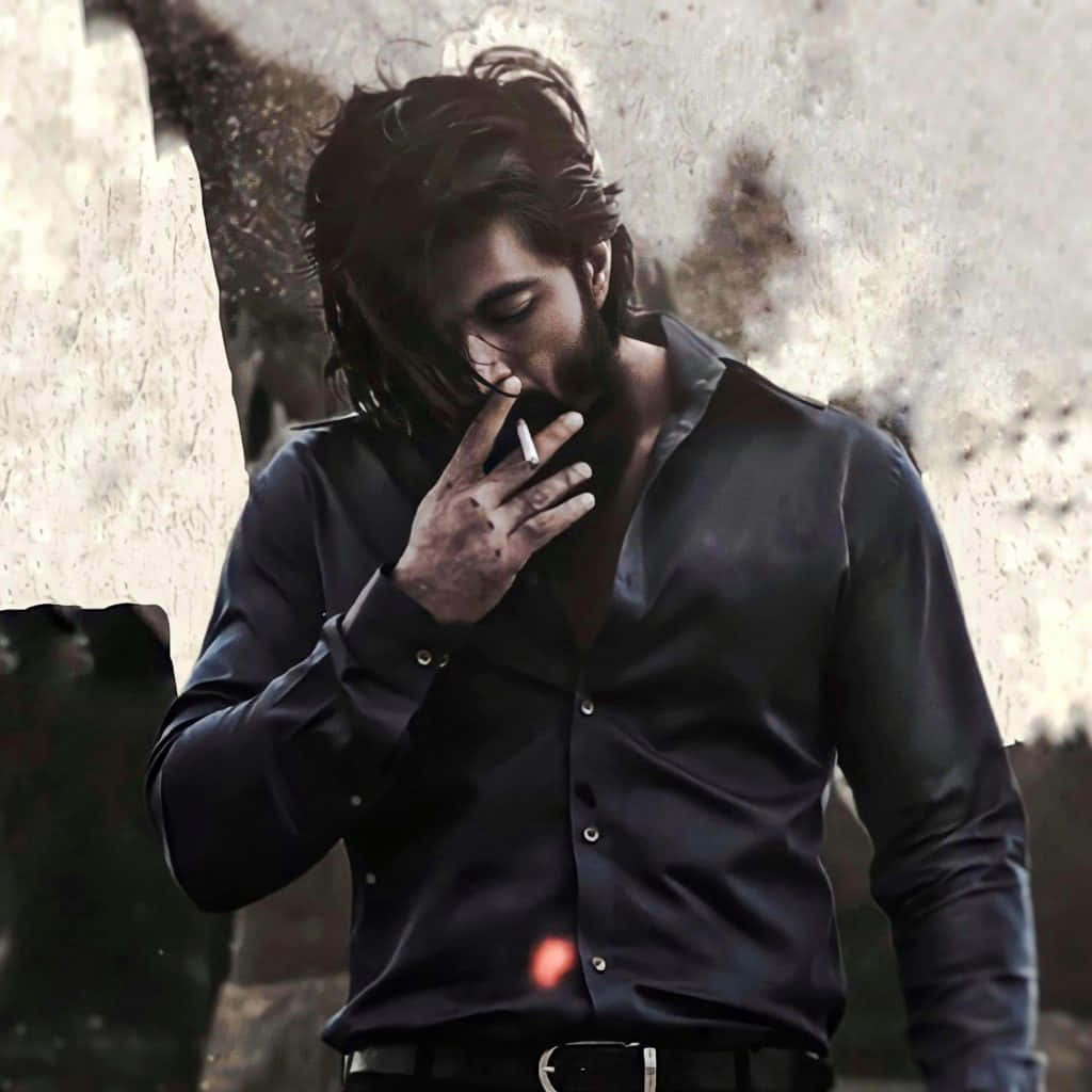 A Man Smoking A Cigarette In A Black Shirt