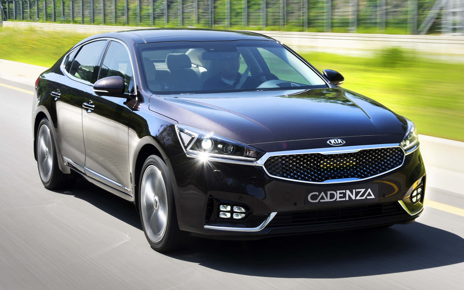 Caption: Sleek and stylish Kia Cadenza on the highway Wallpaper