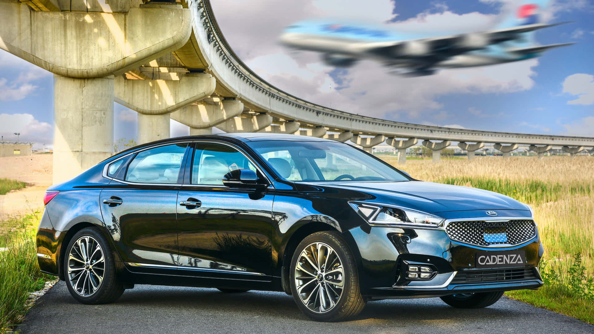 Stunning Kia Cadenza in a futuristic cityscape Wallpaper