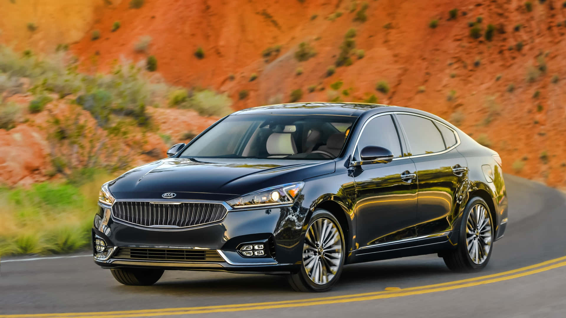 Sleek and Stylish Kia Cadenza in Stunning Scenery Wallpaper