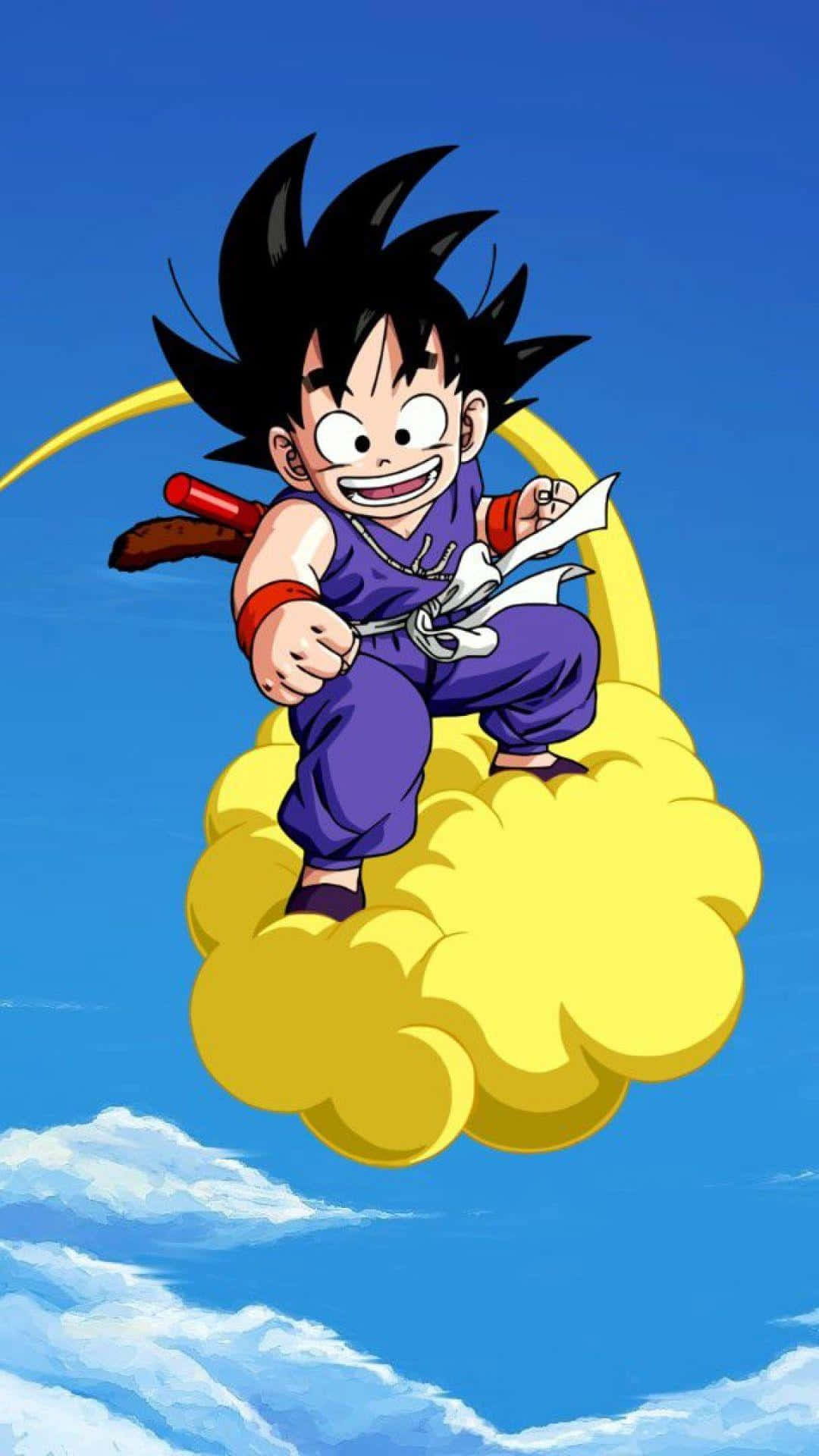 Kid Goku Riding A Yellow Cloud Wallpaper