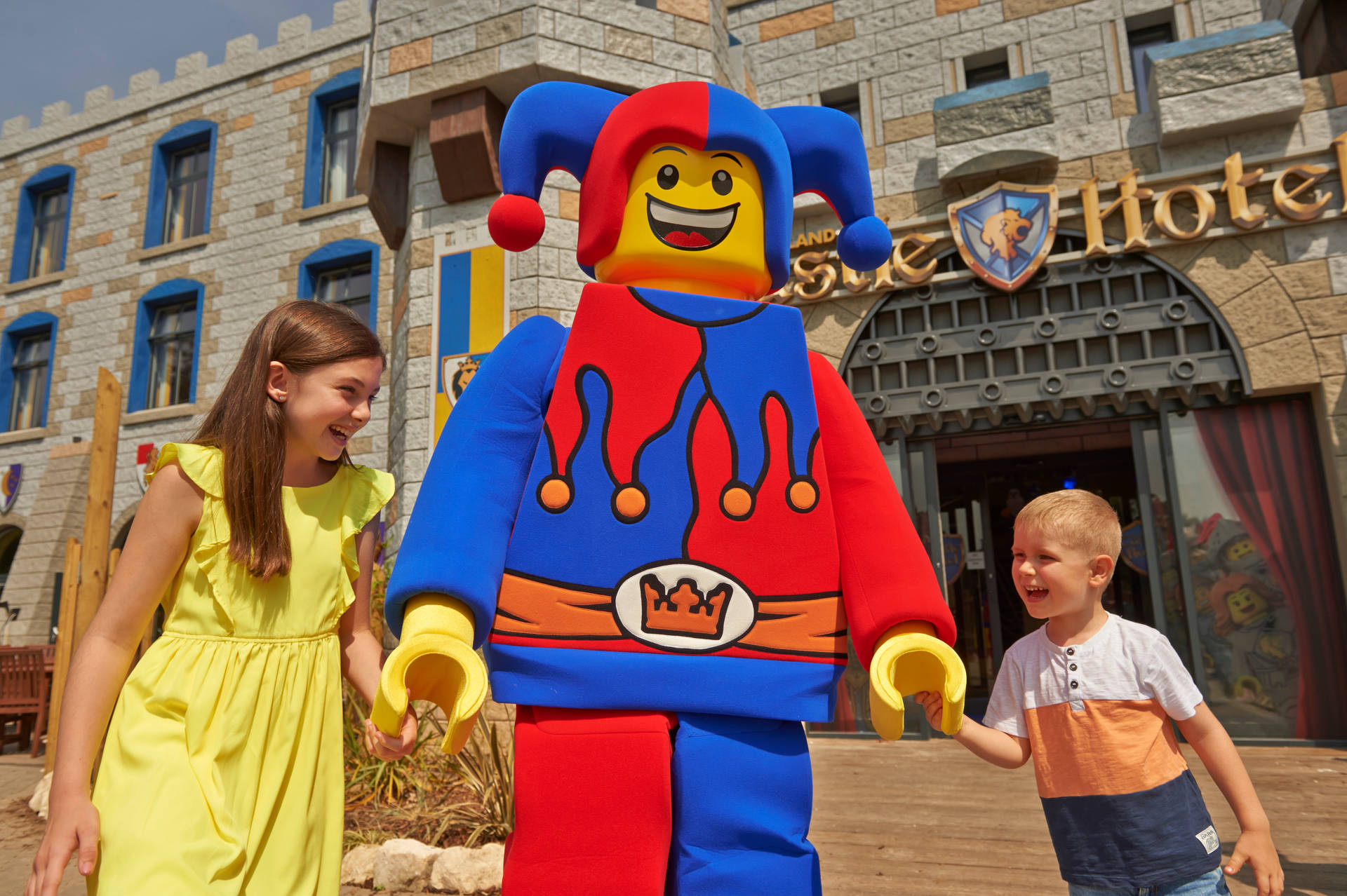 Kids With Court Jester At Legoland Wallpaper