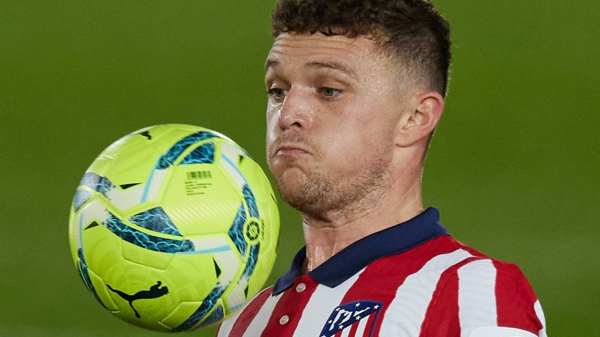 Close-up shot of Kieran Trippier on the field with a soccer ball Wallpaper