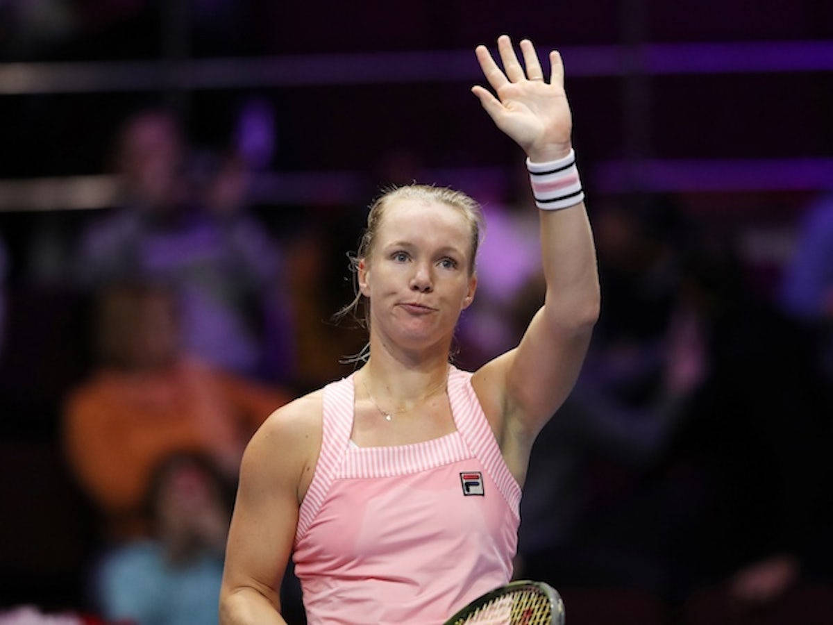 Kiki Bertens acknowledging her fans with a wave Wallpaper