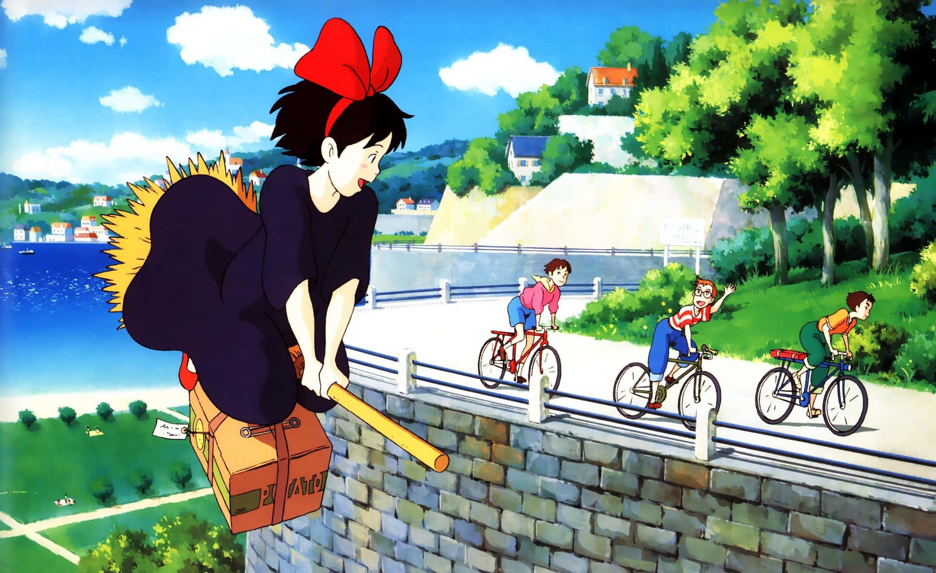 Kiki flying over the city on her broom with Jiji Wallpaper