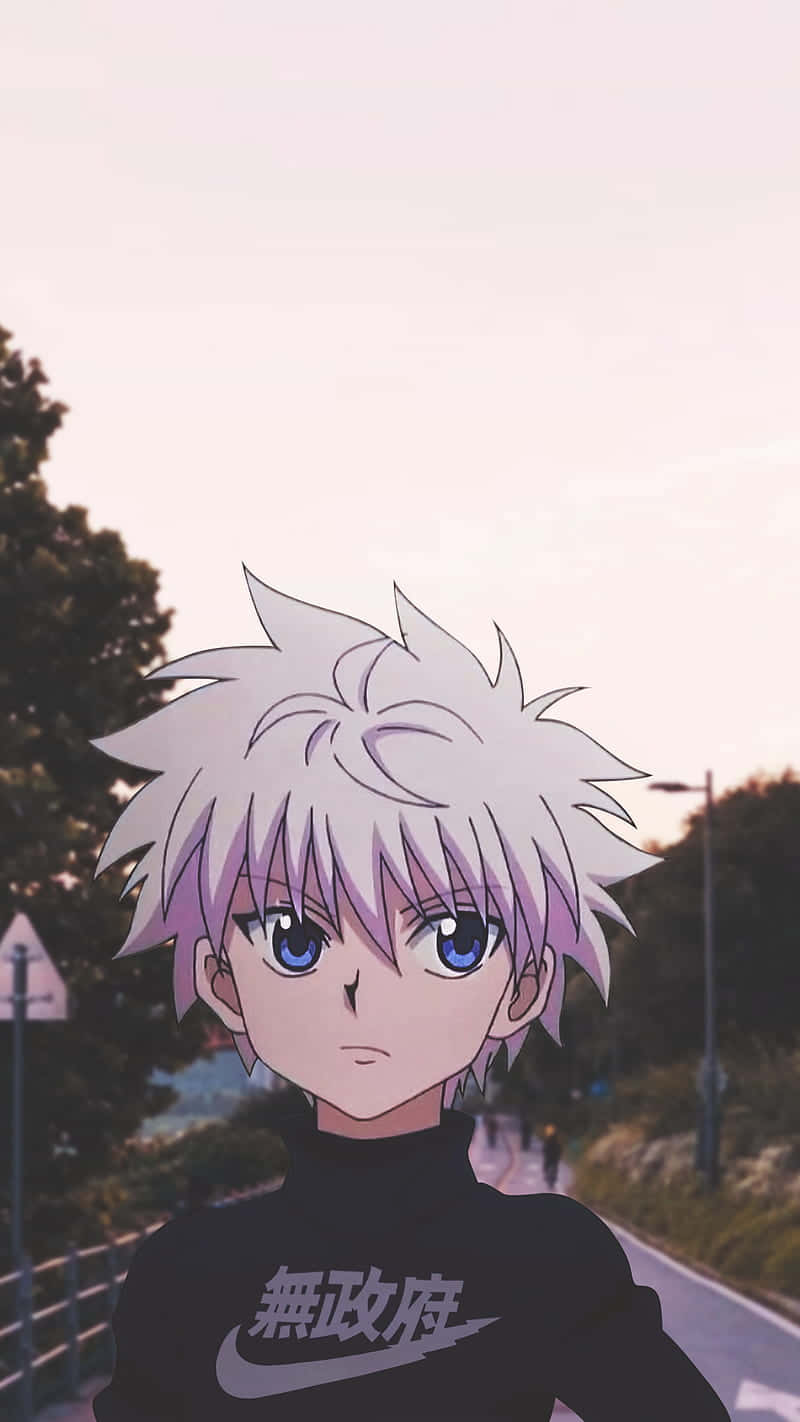 A Boy With Blue Eyes Standing On A Road Wallpaper