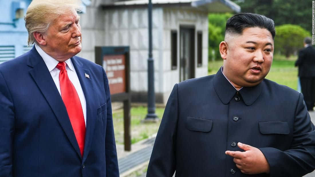 Trump And Kim Jong - Un Are Standing Next To Each Other