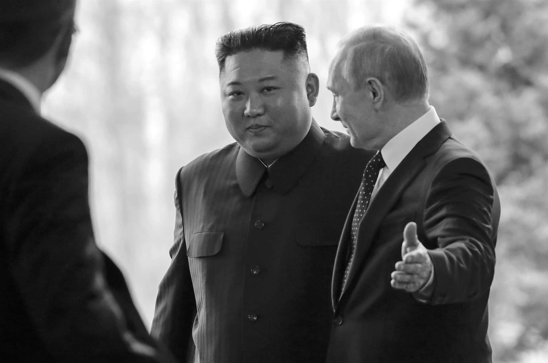 Kim Jong Il And Vladimir Putin Shake Hands