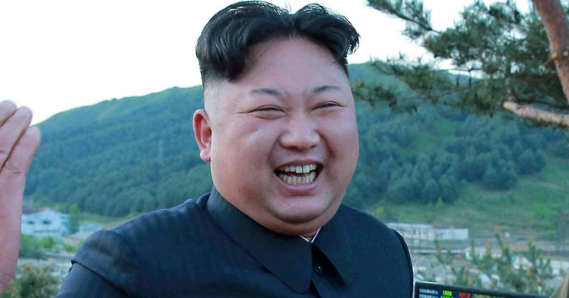 Kim Jong - Un Is Smiling And Waving
