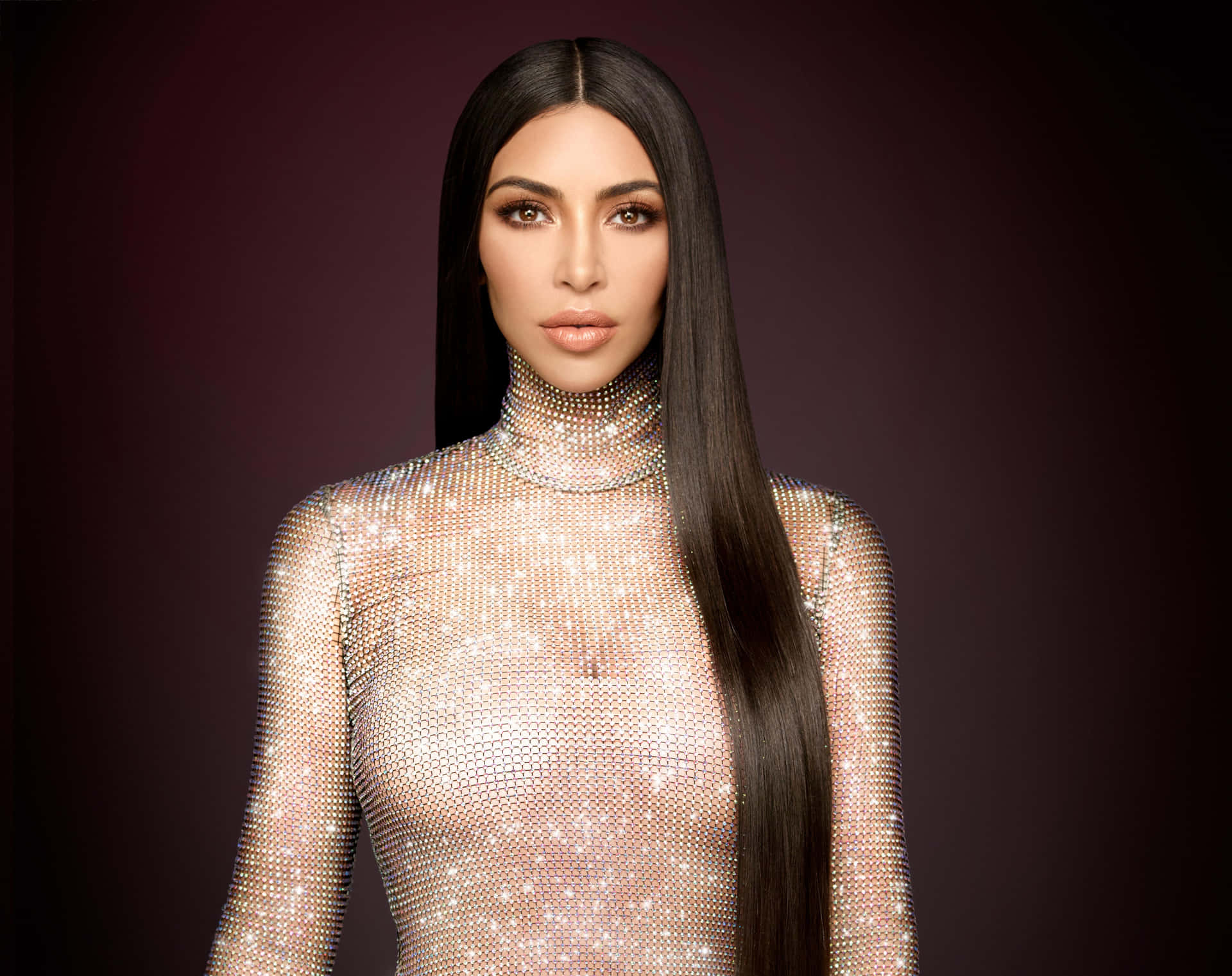 Kim Kardashian looking glamorous in a glamorous outfit