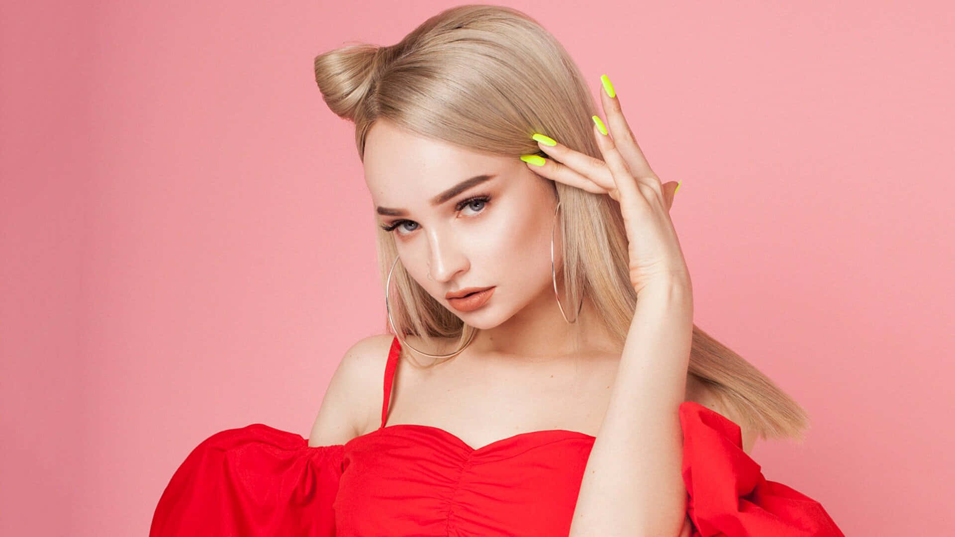 Kim Petras Posing In A Stylishly Edgy Outfit Wallpaper