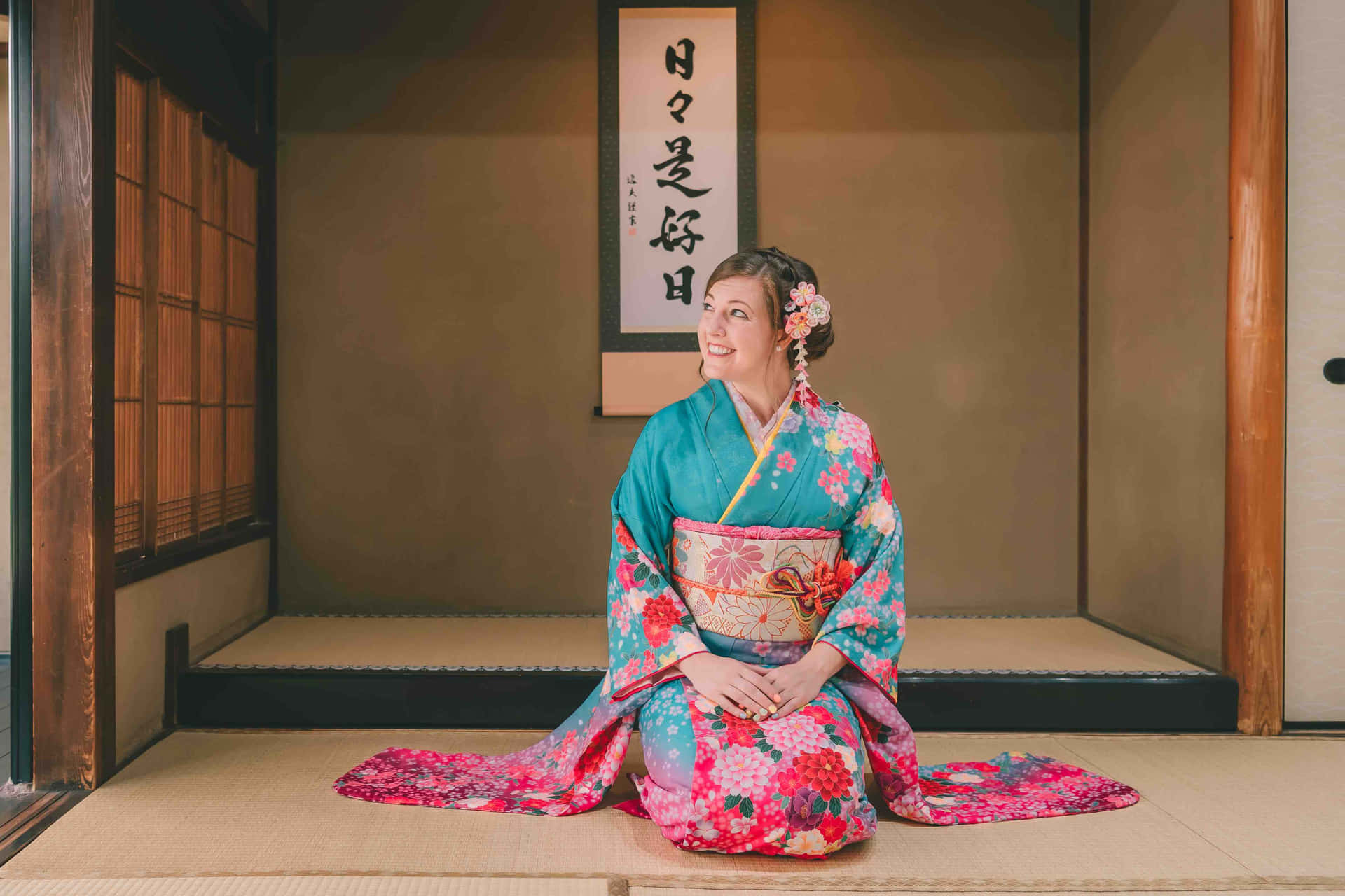 A beautiful woman wearing a traditional Japanese kimono.