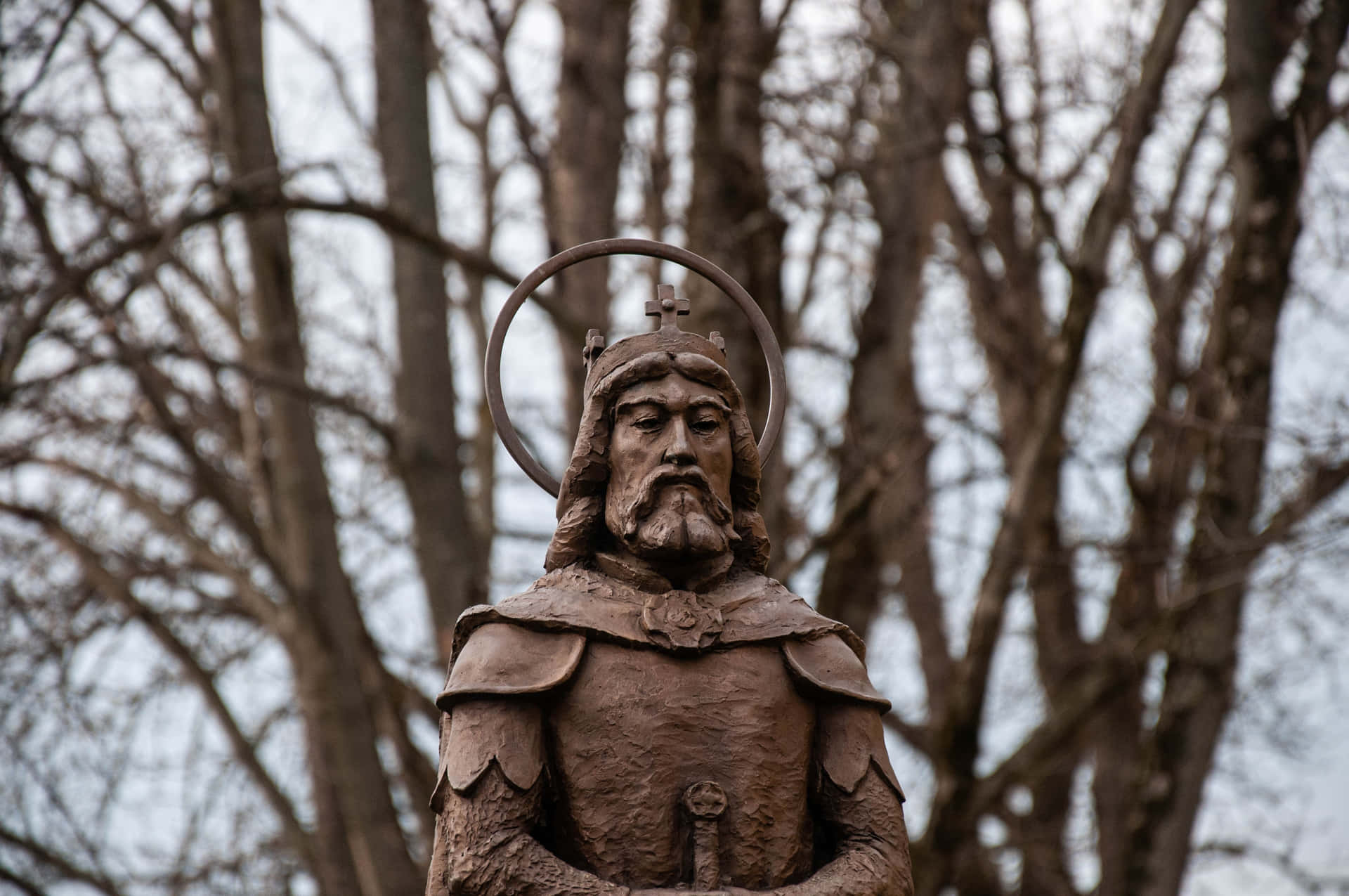 A Statue Of A Man In Armor