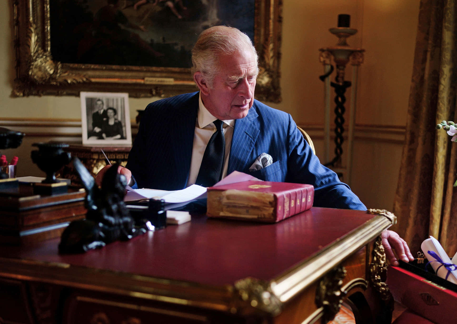 King Charles Iii Signing Papers Wallpaper