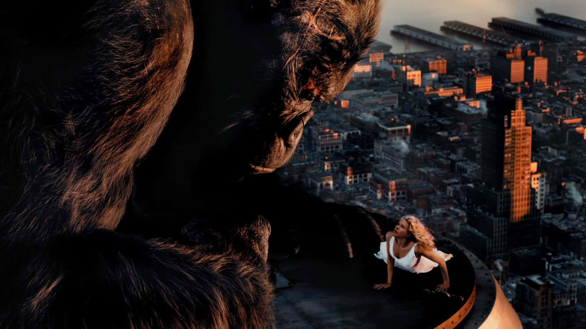 Caption: King Kong Roaring on Top of the Empire State Building Wallpaper