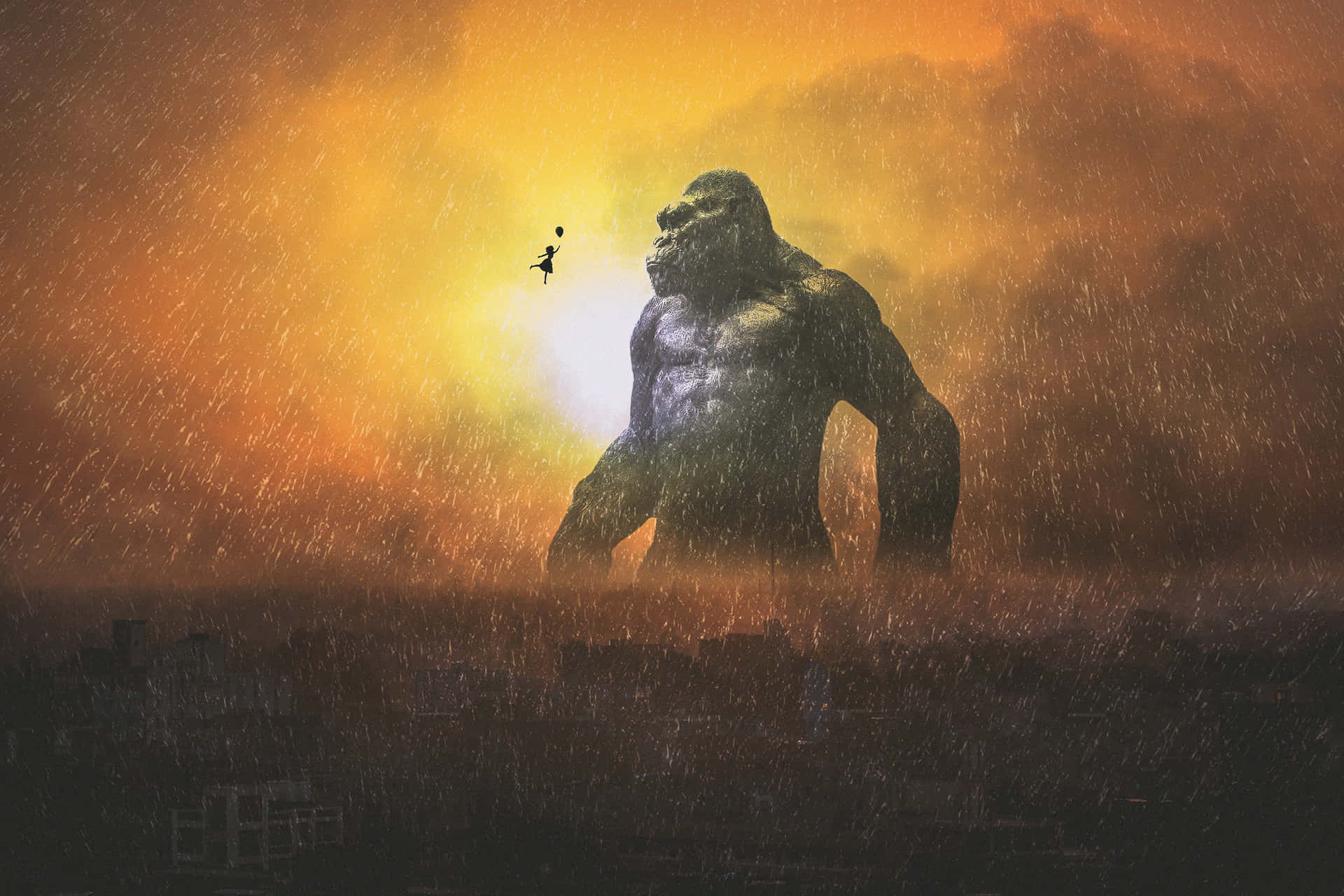 King Kong Standing Tall on a Building Against a Fiery Background Wallpaper