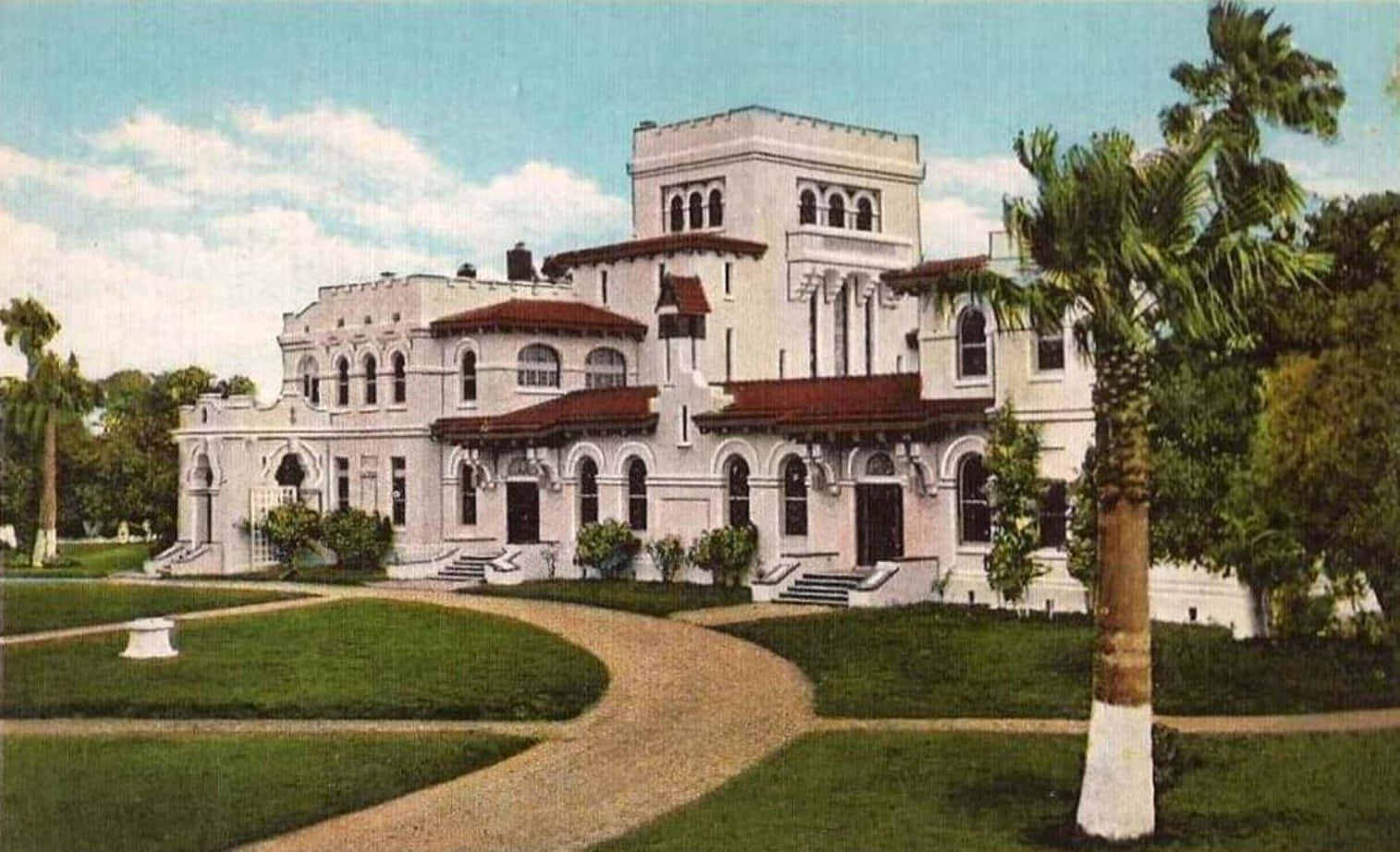 A Postcard Showing A Large White Building With Palm Trees