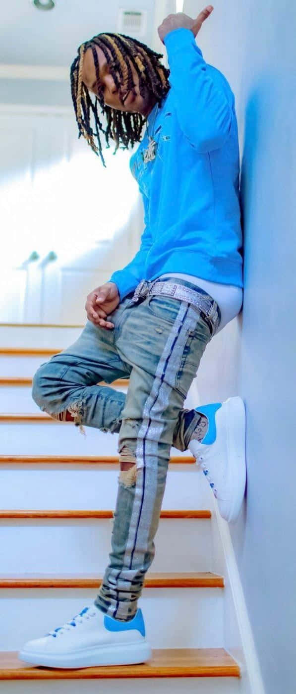 King Von Blue Sweatshirt Staircase Pose Wallpaper