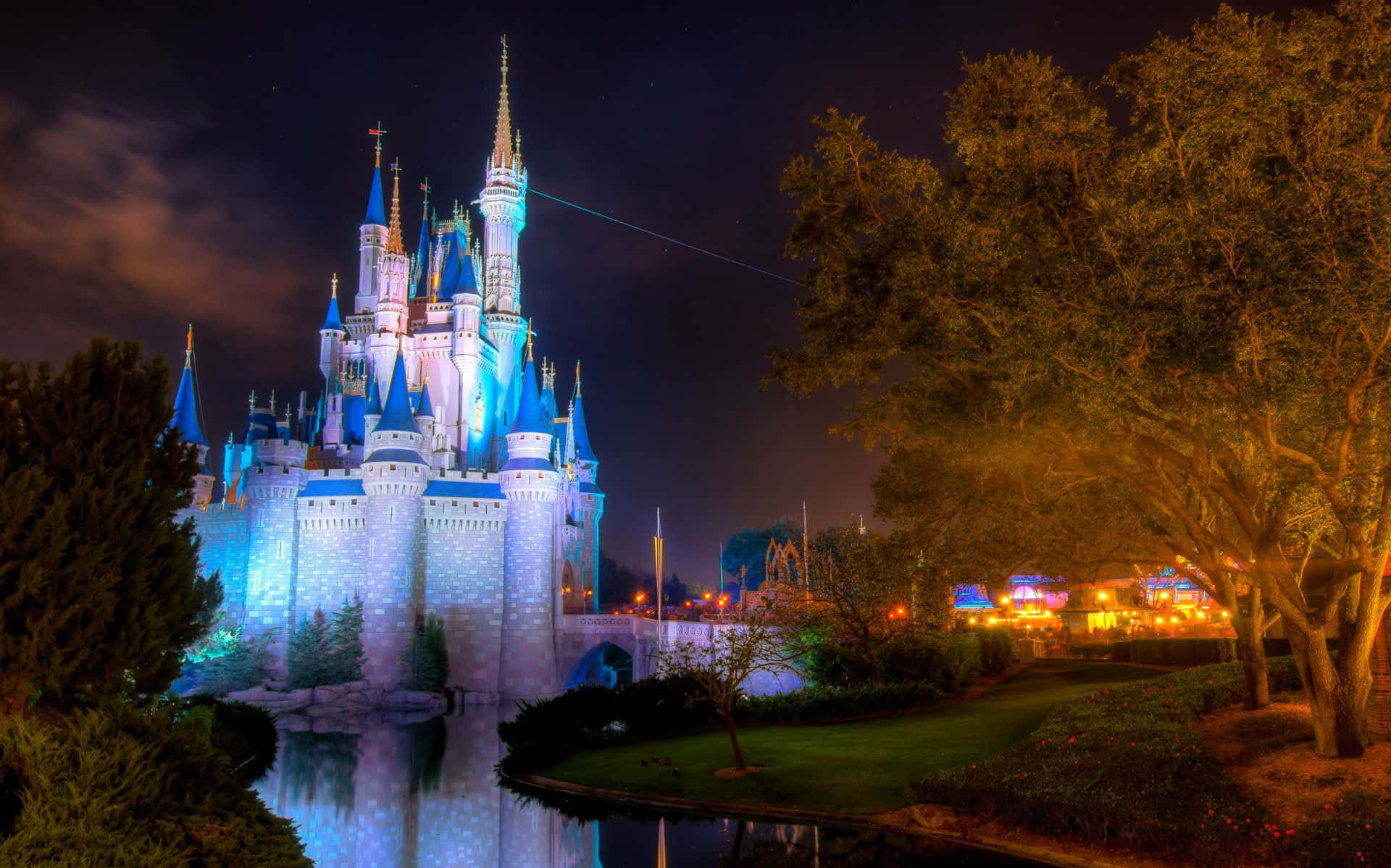 Cinderella Castle At Night With A Pond