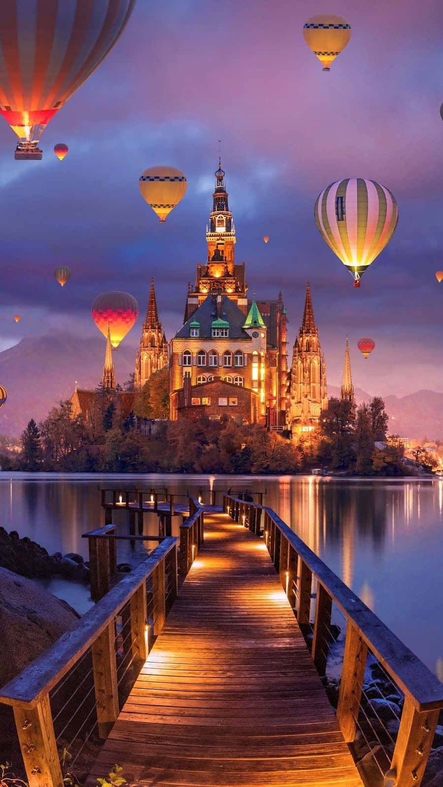 Hot Air Balloons Flying Over A Bridge And Castle