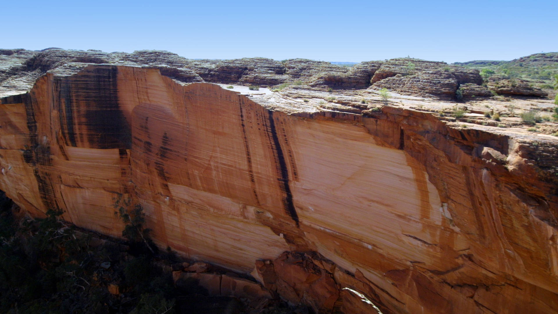 Transportér dig til australske Kings Canyon med dette eventyrlige landskabsbaggrundsbillede. Wallpaper