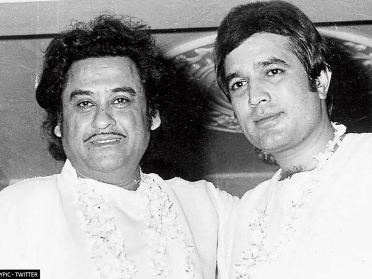 Indian cinema icons Kishore Kumar and Rajesh Khanna sharing a candid moment Wallpaper