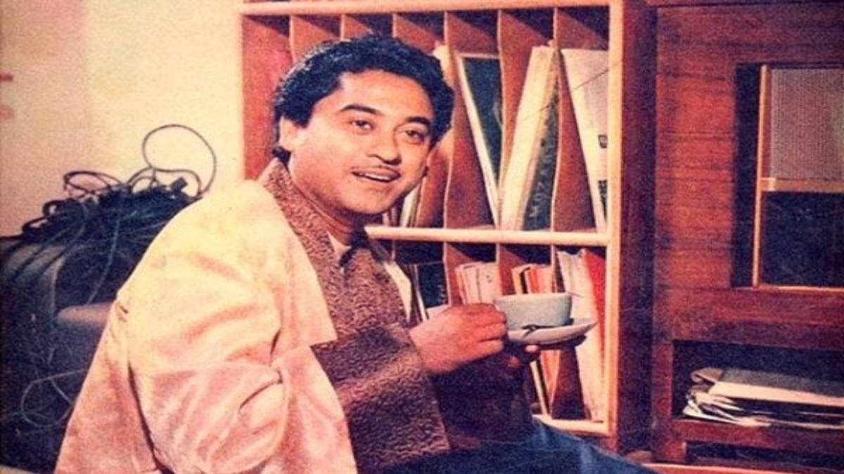 Kishore Kumar Holding A Cup Wallpaper