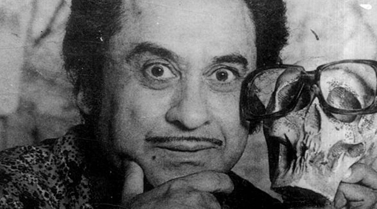 Kishore Kumar holder en lille knogle. Wallpaper