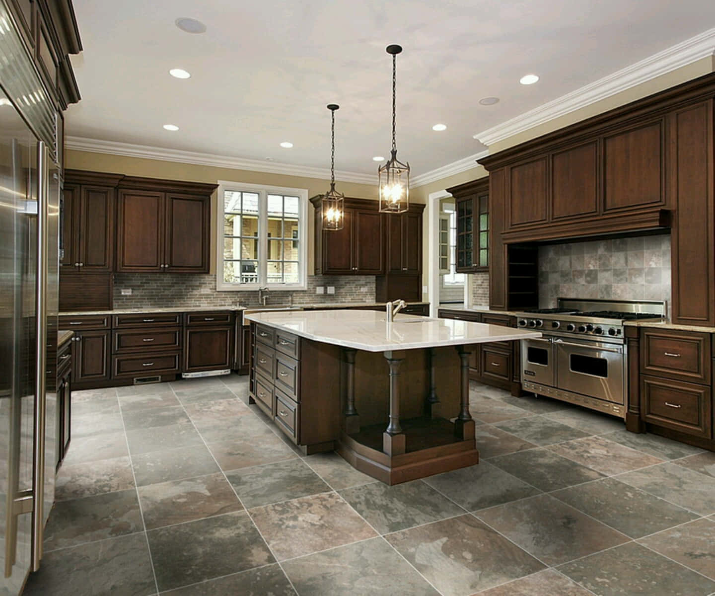 A Kitchen With Brown Cabinets And A Center Island