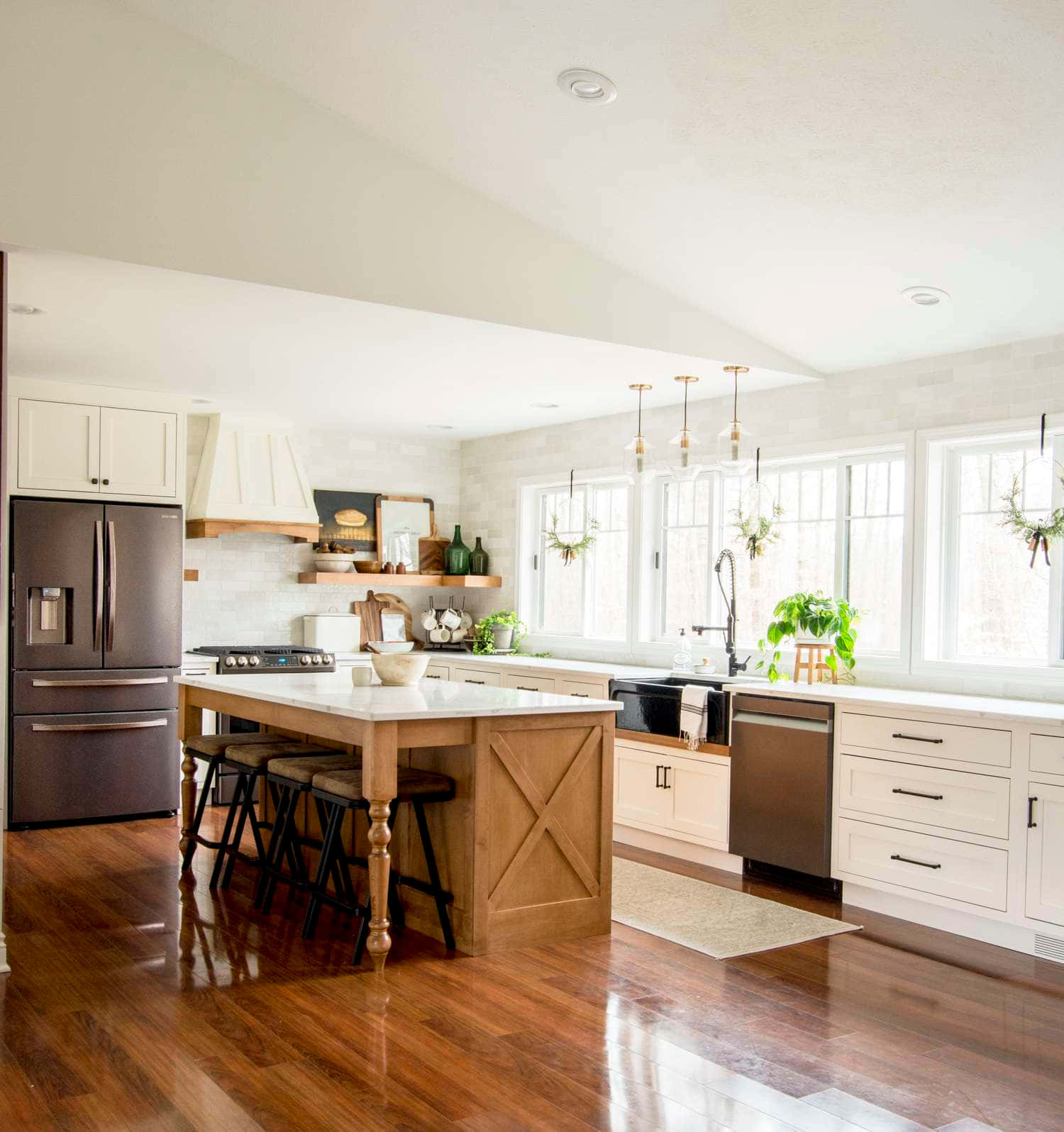 Enjoy a cup of coffee while breezing through your favorite cookbook in this bright, cozy kitchen