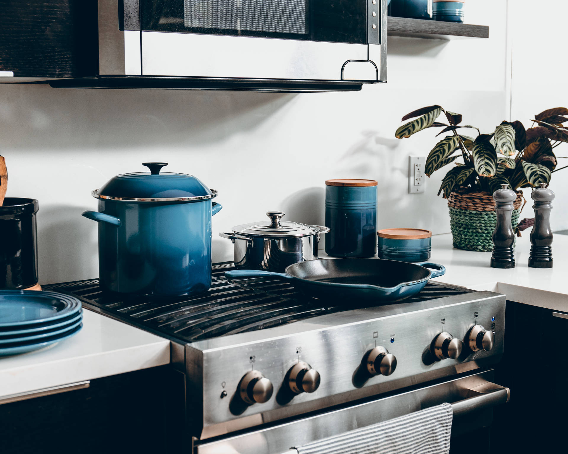 Kitchen With Beautiful Blue Cookware Wallpaper