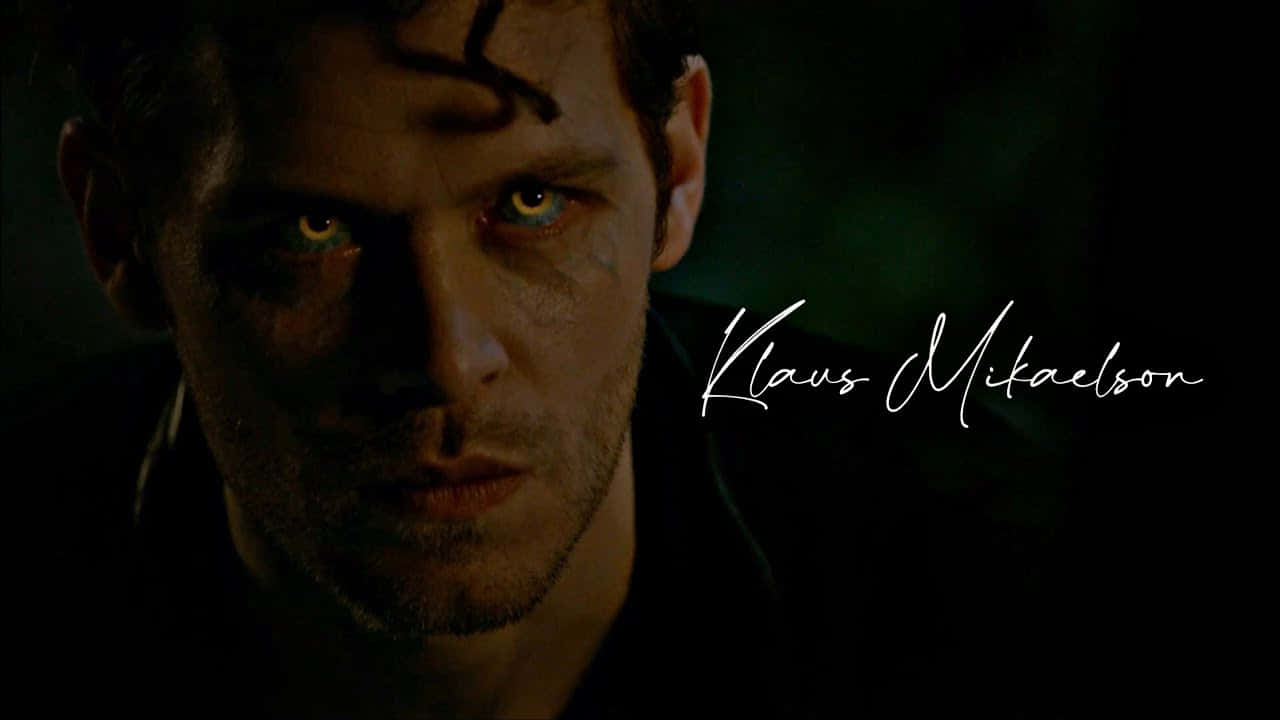 Klaus Mikaelson Glowing Eyes And Name Wallpaper