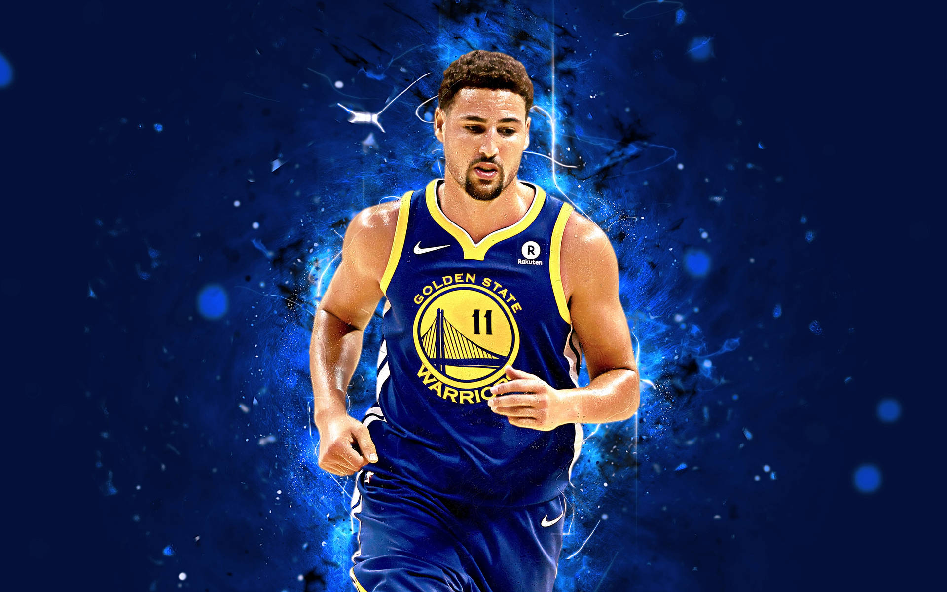 Klay Thompson In Action On The Basketball Court Wallpaper
