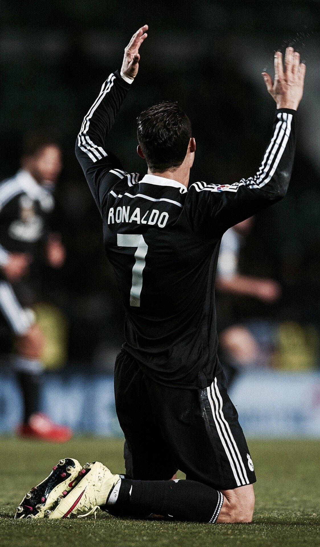 Kneeling Cristiano Ronaldo iPhone Wallpaper