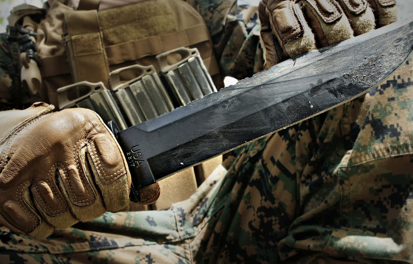A Soldier Holding A Knife