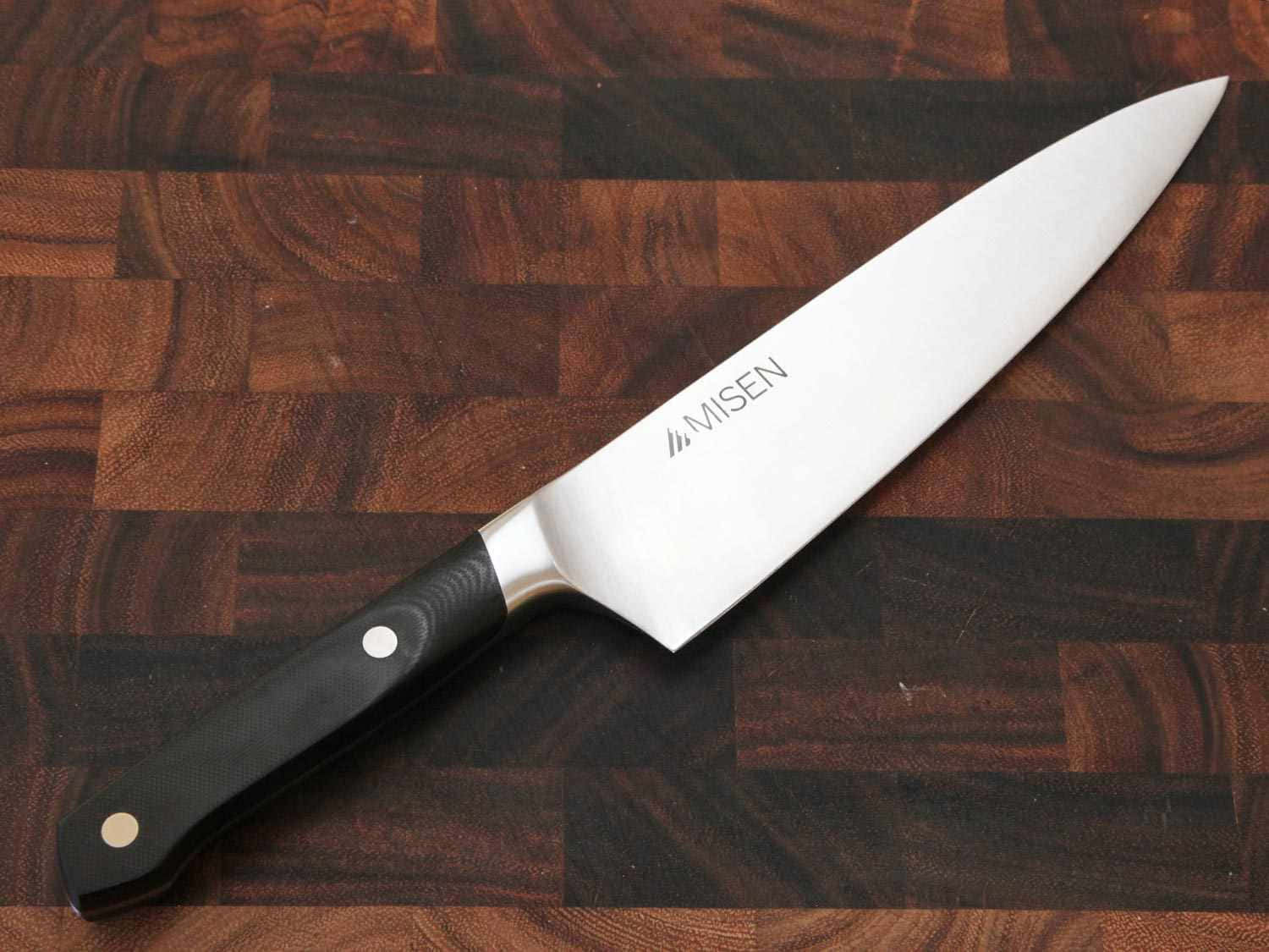 A Knife On A Wooden Cutting Board