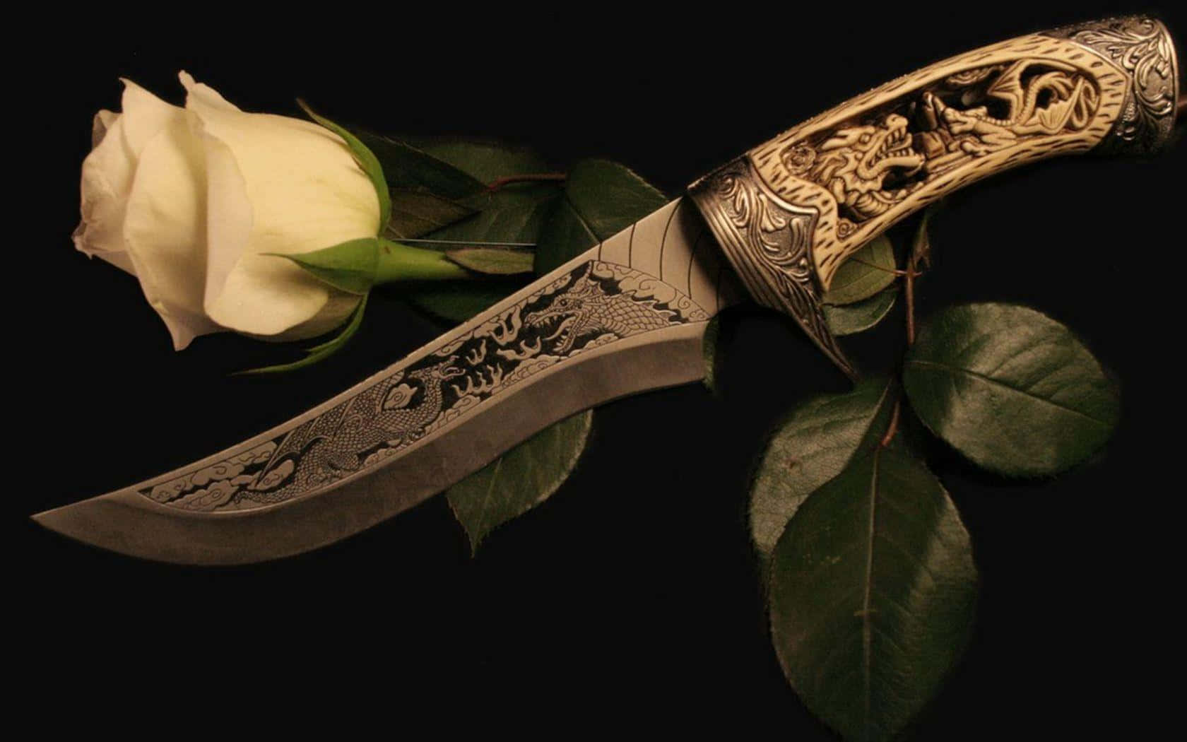 A Knife With A Rose And A Black Background