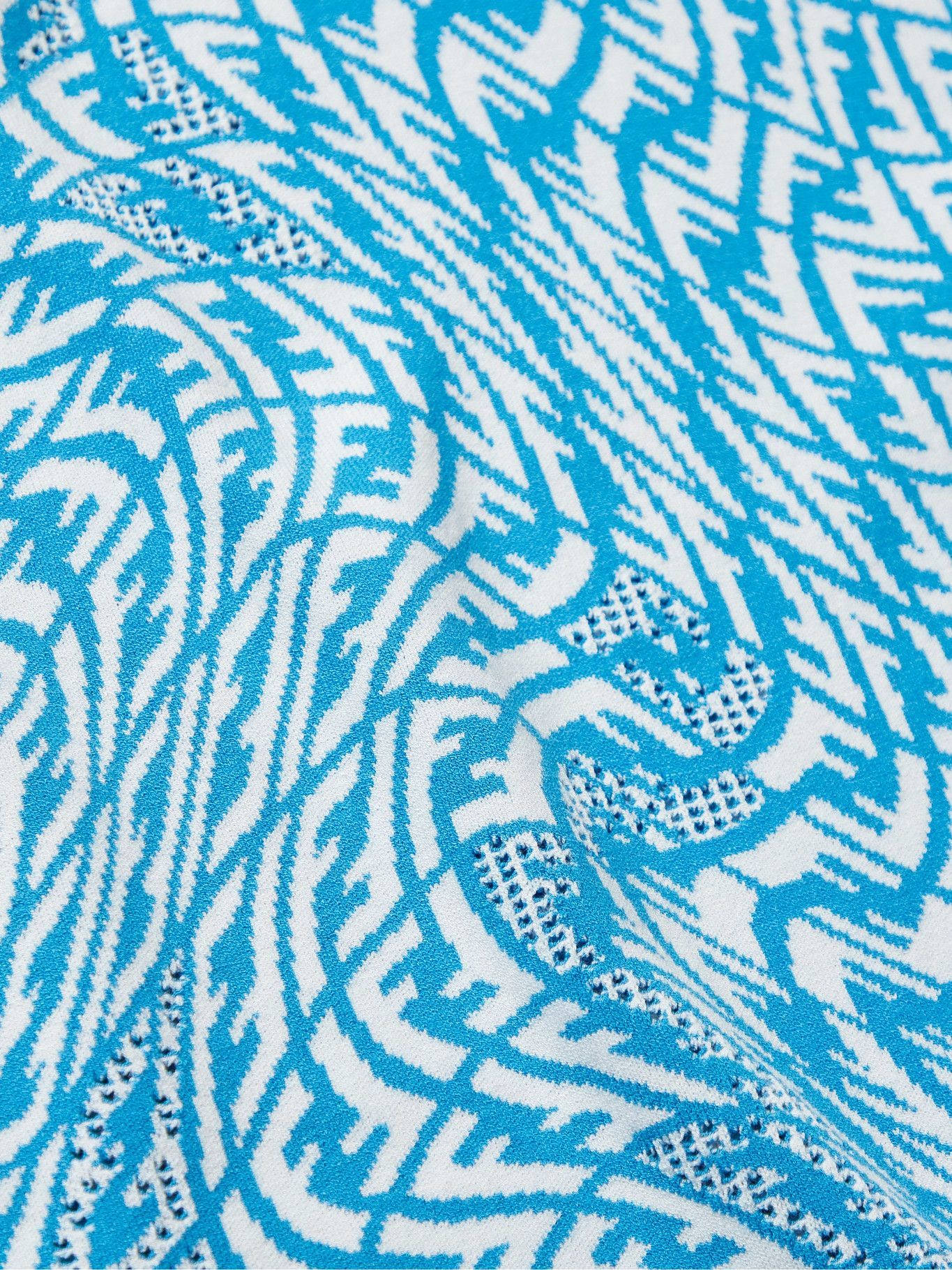 Knitted Designer Fendi Fabric With Logo Wallpaper