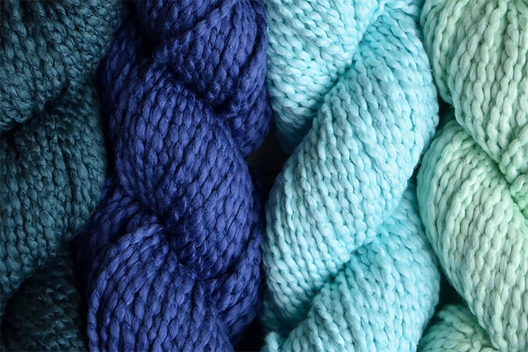 Knitting Yarns In Shades Of Blue Wallpaper