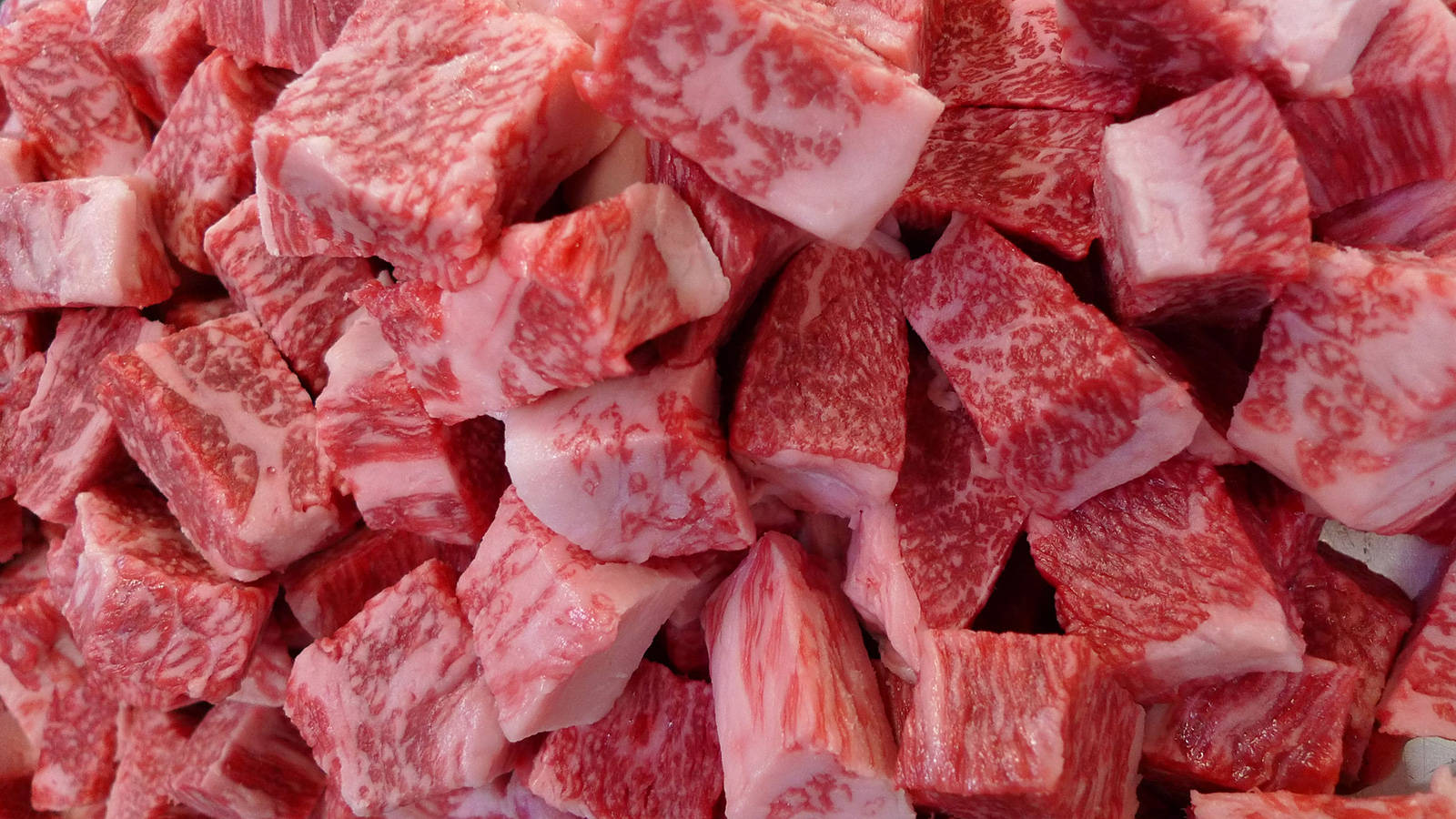 Cubospequeños Y Gruesos De Carne Kobe. Fondo de pantalla