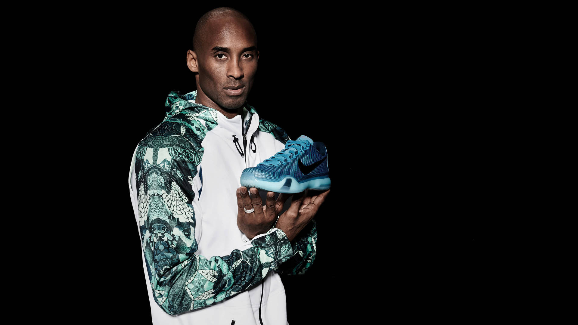 Kobe Bryant Modeling Nike Shoe 4K Wallpaper