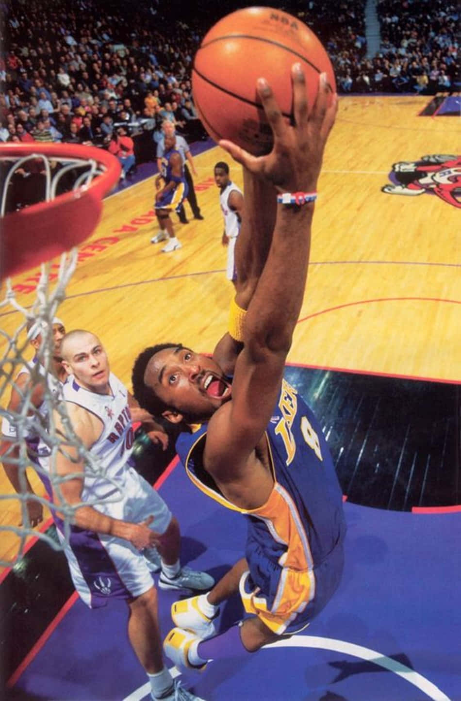 Kobe Bryant's Signature Dunk Over Dwight Howard Wallpaper