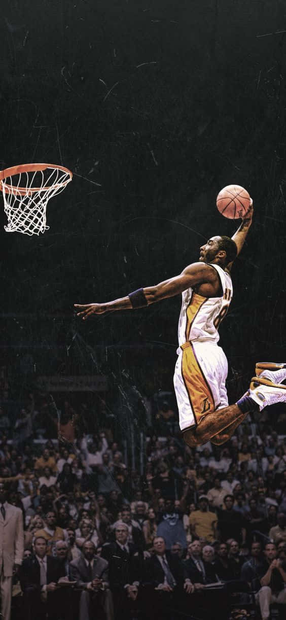 Kobe Bryant is dunking with style and grace. Wallpaper