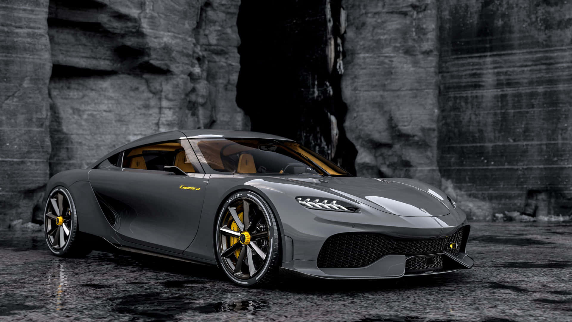 A Grey Sports Car Is Parked In Front Of A Rock Wallpaper