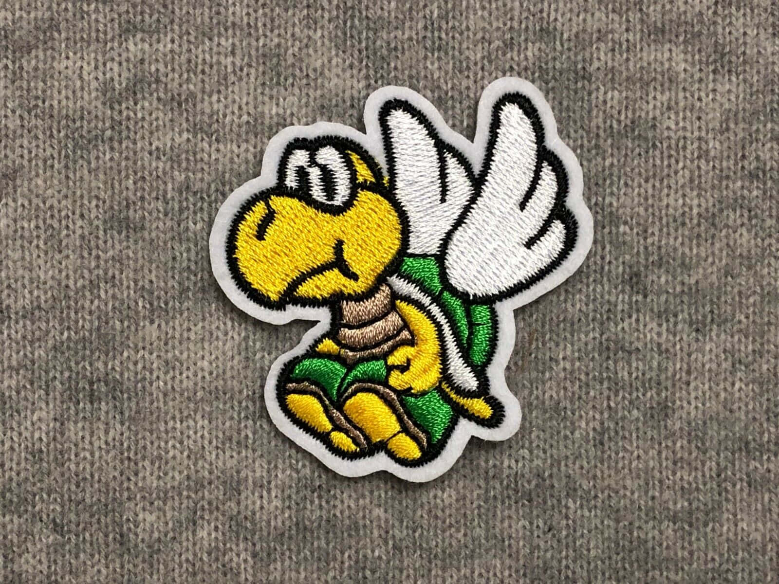 Koopa Troopa marching on a colorful platform Wallpaper