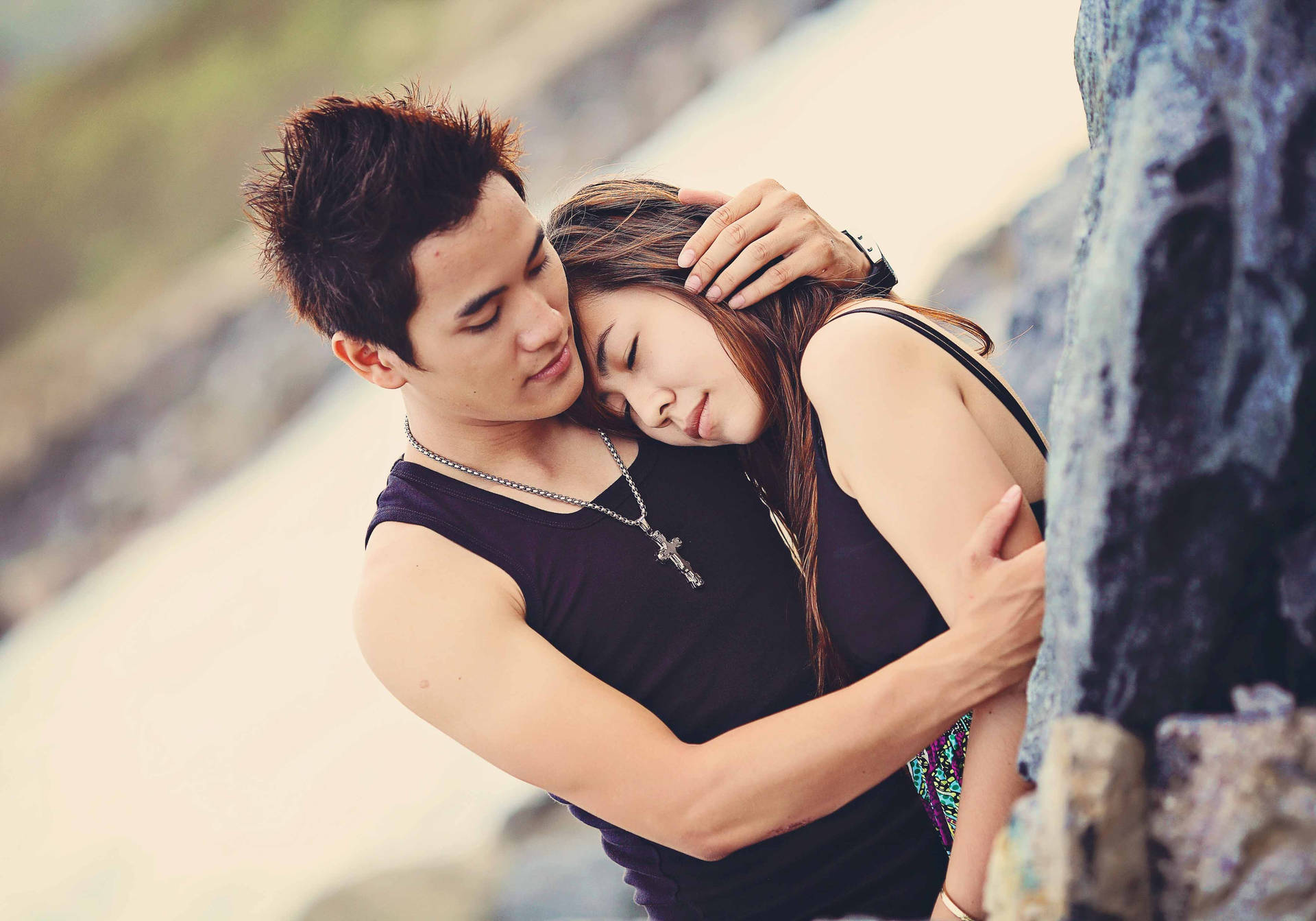 Korean Couple In Sleeveless Black Tops Wallpaper