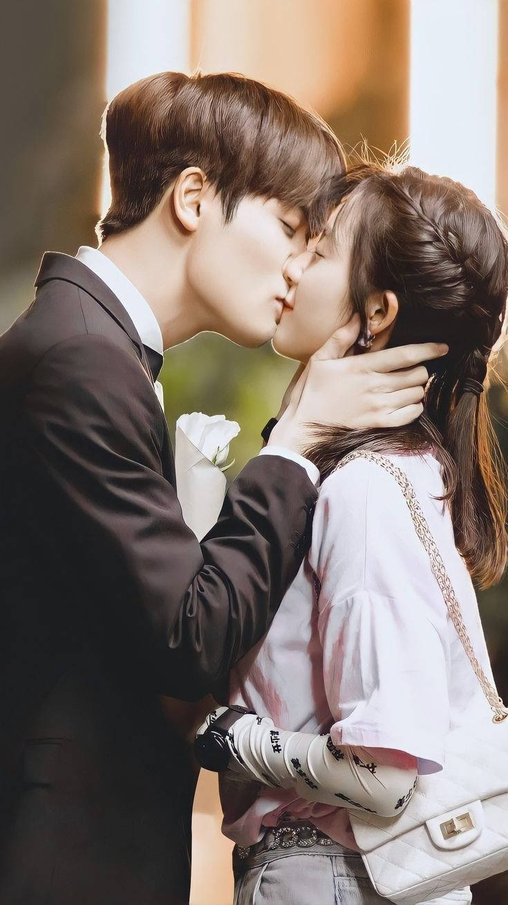 Koreansk par intens kysseri Wallpaper