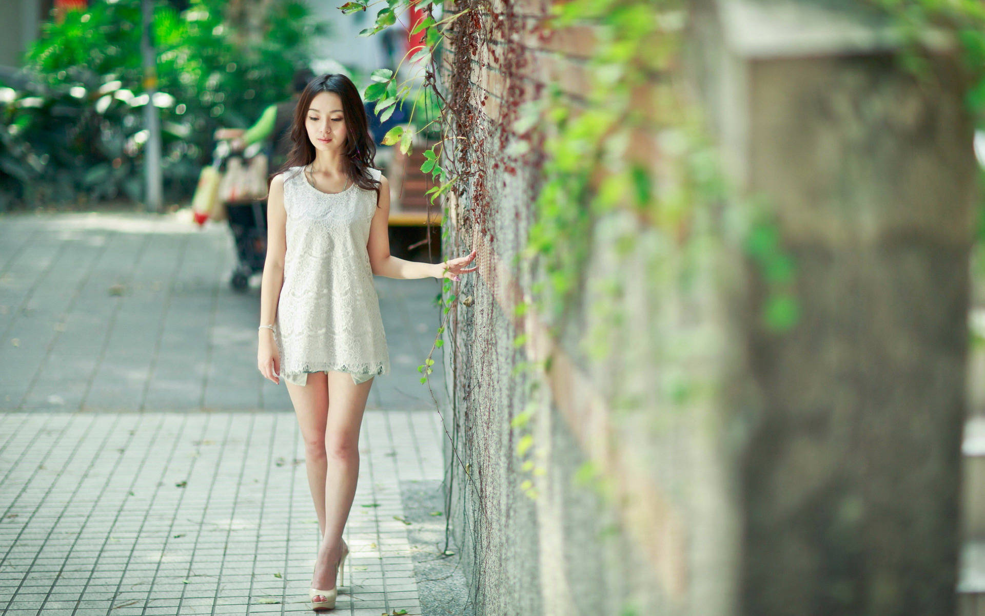Korean Girl Walking Down The Street Wallpaper