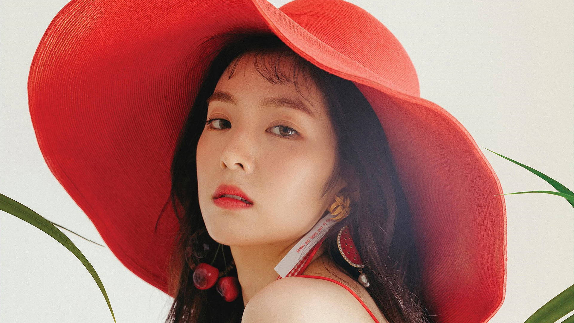 Chicacoreana Con Un Sombrero Rojo Del Sol Fondo de pantalla