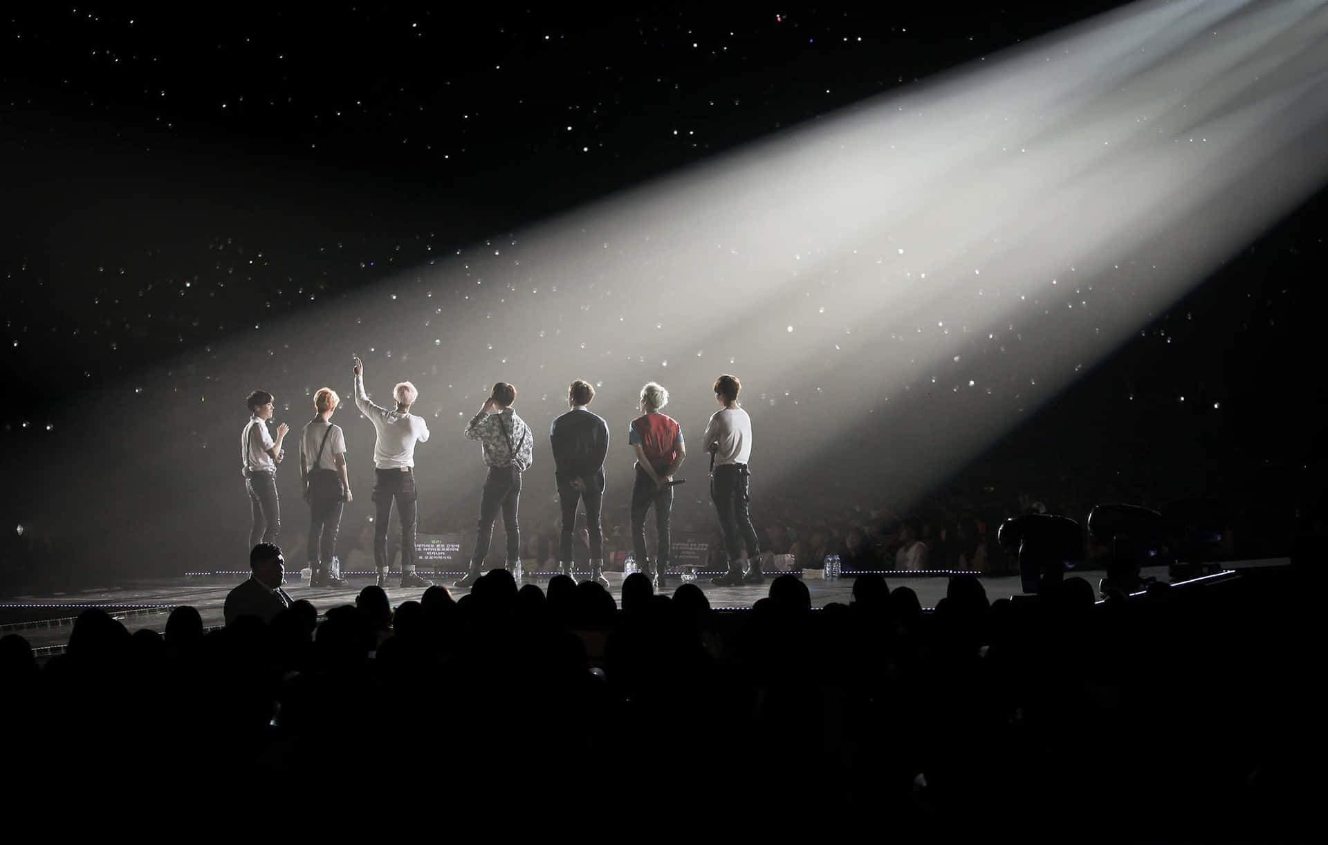 Korean Idols Bts On Concert Stage Wallpaper